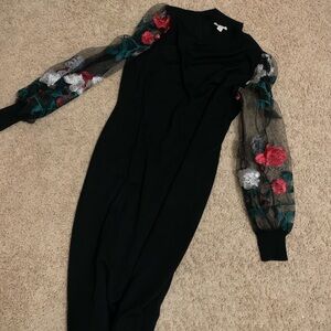 Elegant Black Dress with Floral Sleeves
